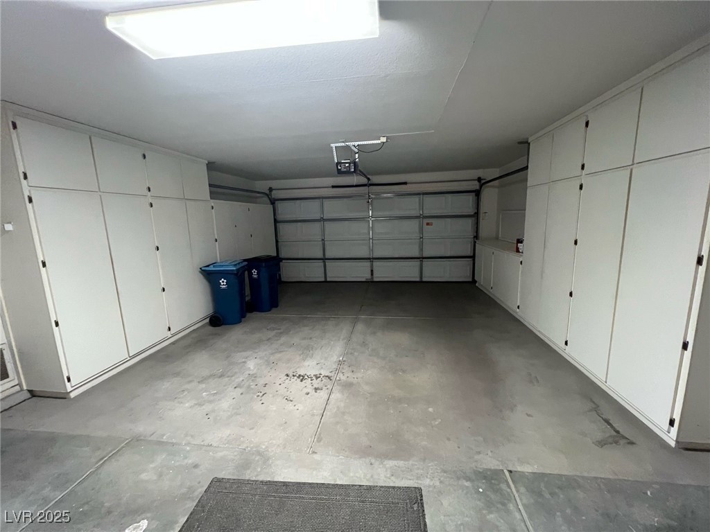 2306 Spring Water Drive Las Vegas, NV 89134 - Photo 19 of 24 View of garage