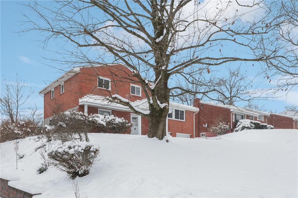 537 Fieldstone Drive Monroeville, PA 15146 - Photo 35 of 40 a view of a house with a snow in the yard