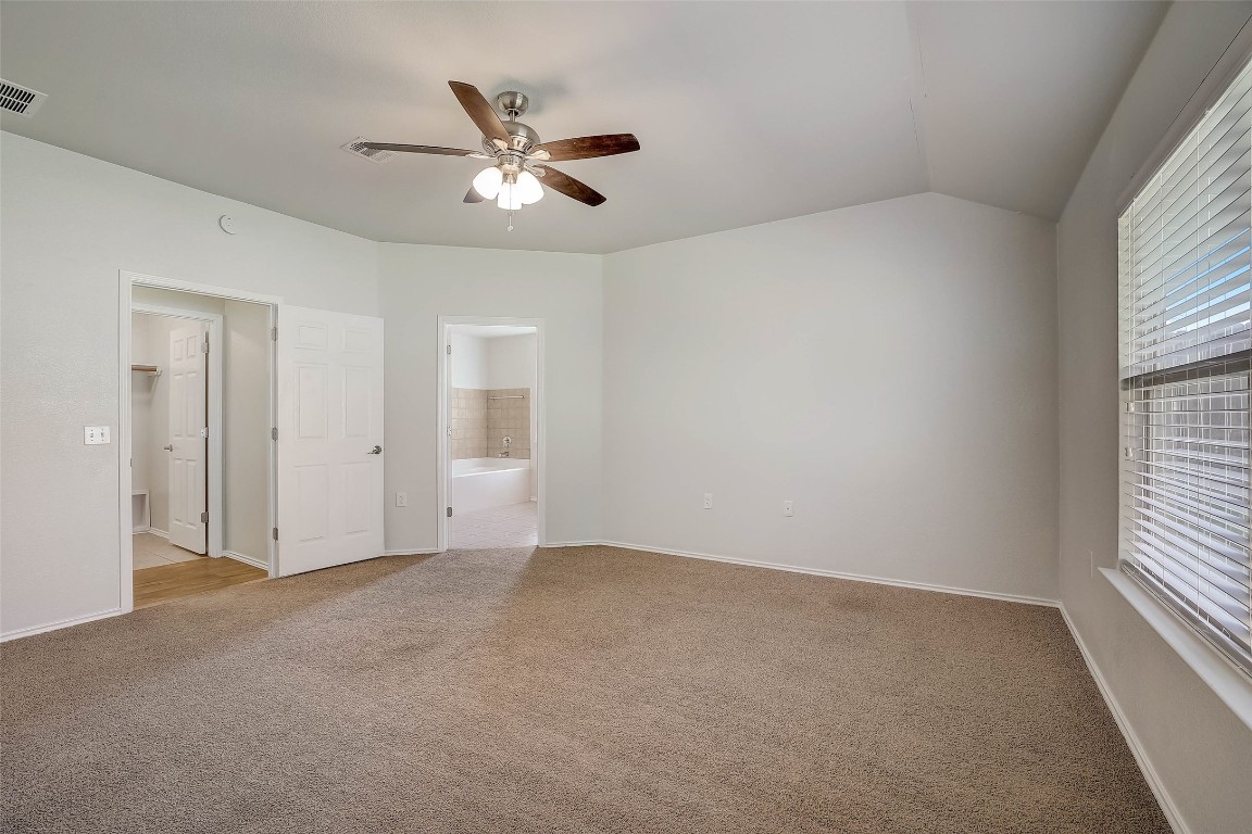 5800 Silver Screen Drive Austin, TX 78747 - Photo 18 of 31 a view of an empty room and window