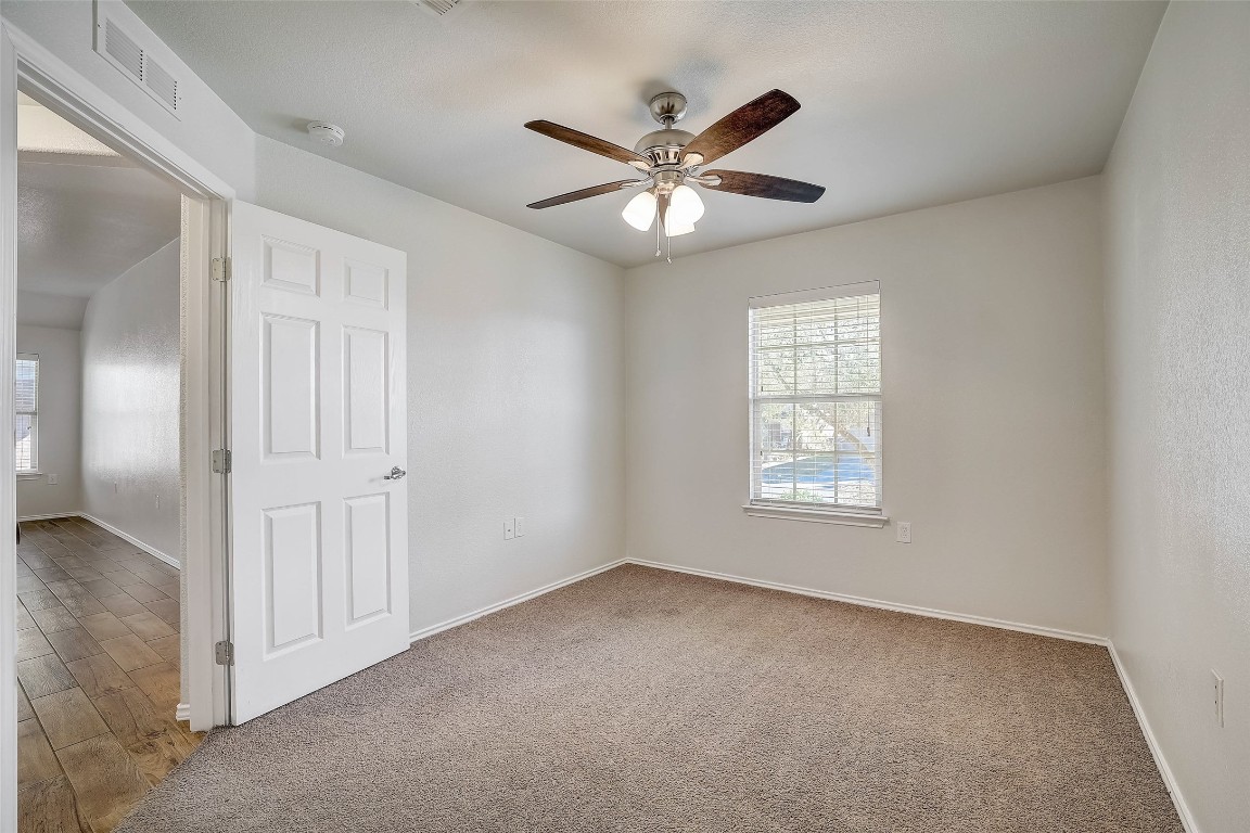5800 Silver Screen Drive Austin, TX 78747 - Photo 23 of 31 a view of an empty room with a window