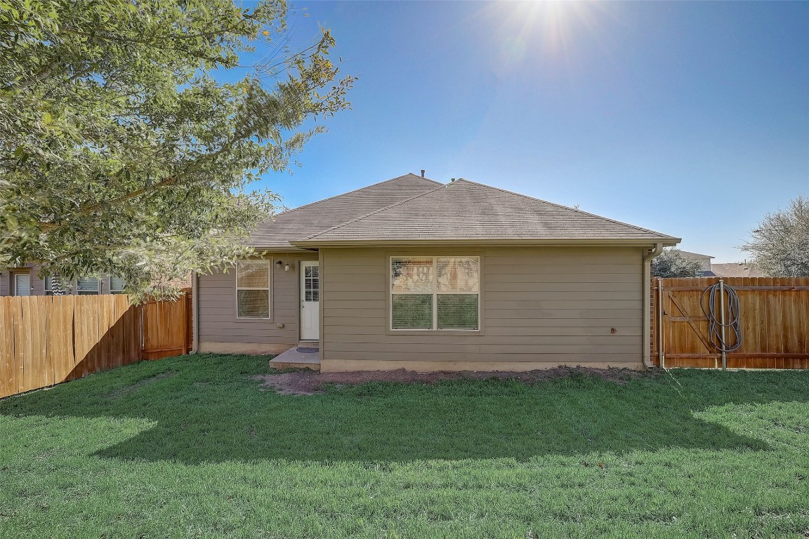 5800 Silver Screen Drive Austin, TX 78747 - Photo 29 of 31 a front view of house with yard and green space