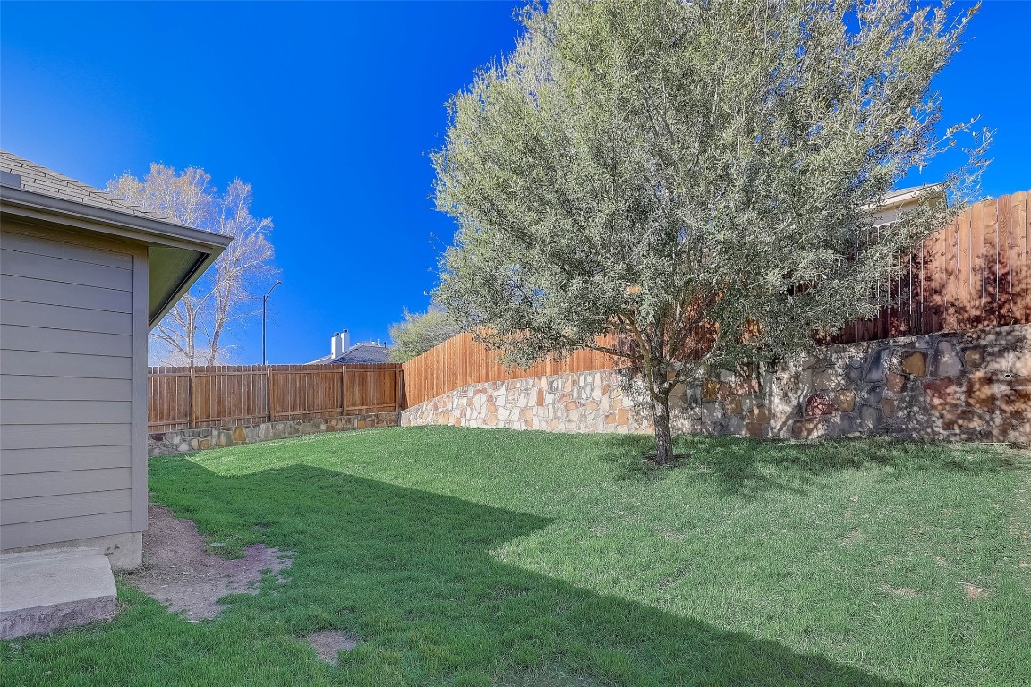 5800 Silver Screen Drive Austin, TX 78747 - Photo 31 of 31 a view of backyard with green space