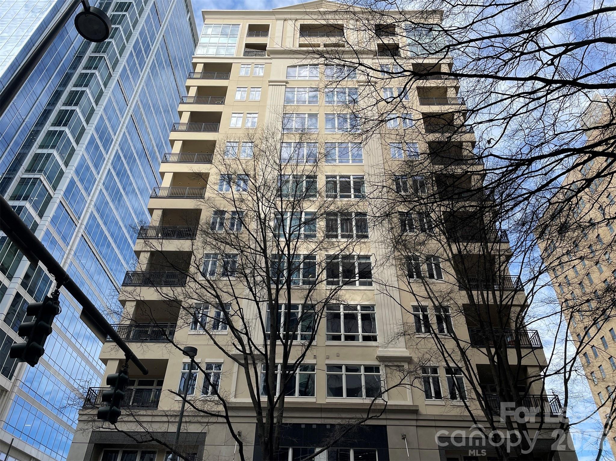 230 South Tryon Street, Unit 1002 Charlotte, NC 28202 - Photo 1 of 19 front view of a building