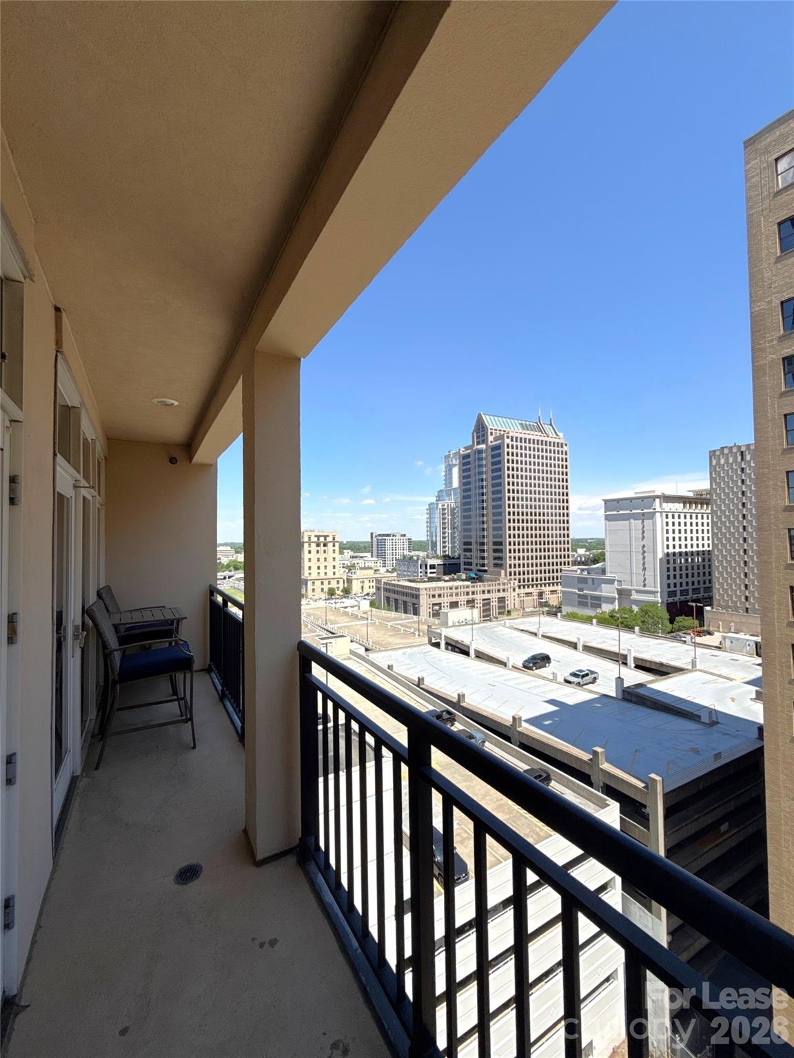 230 South Tryon Street, Unit 1002 Charlotte, NC 28202 - Photo 14 of 19 a view of a terrace with city view