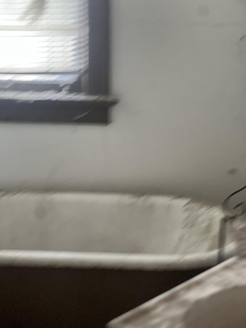 506 157th Street Calumet City, IL 60409 - Photo 5 of 10 a view of a bathtub in a window