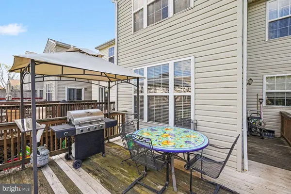 a view of a chairs and table in a patio