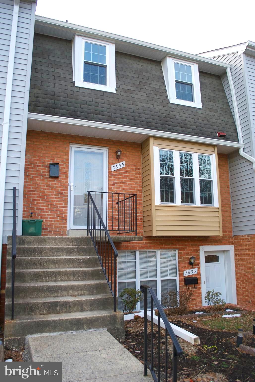 7635 Arbory Court, Unit 65 Laurel, MD 20707 - Photo 2 of 33 a front view of a house with stairs