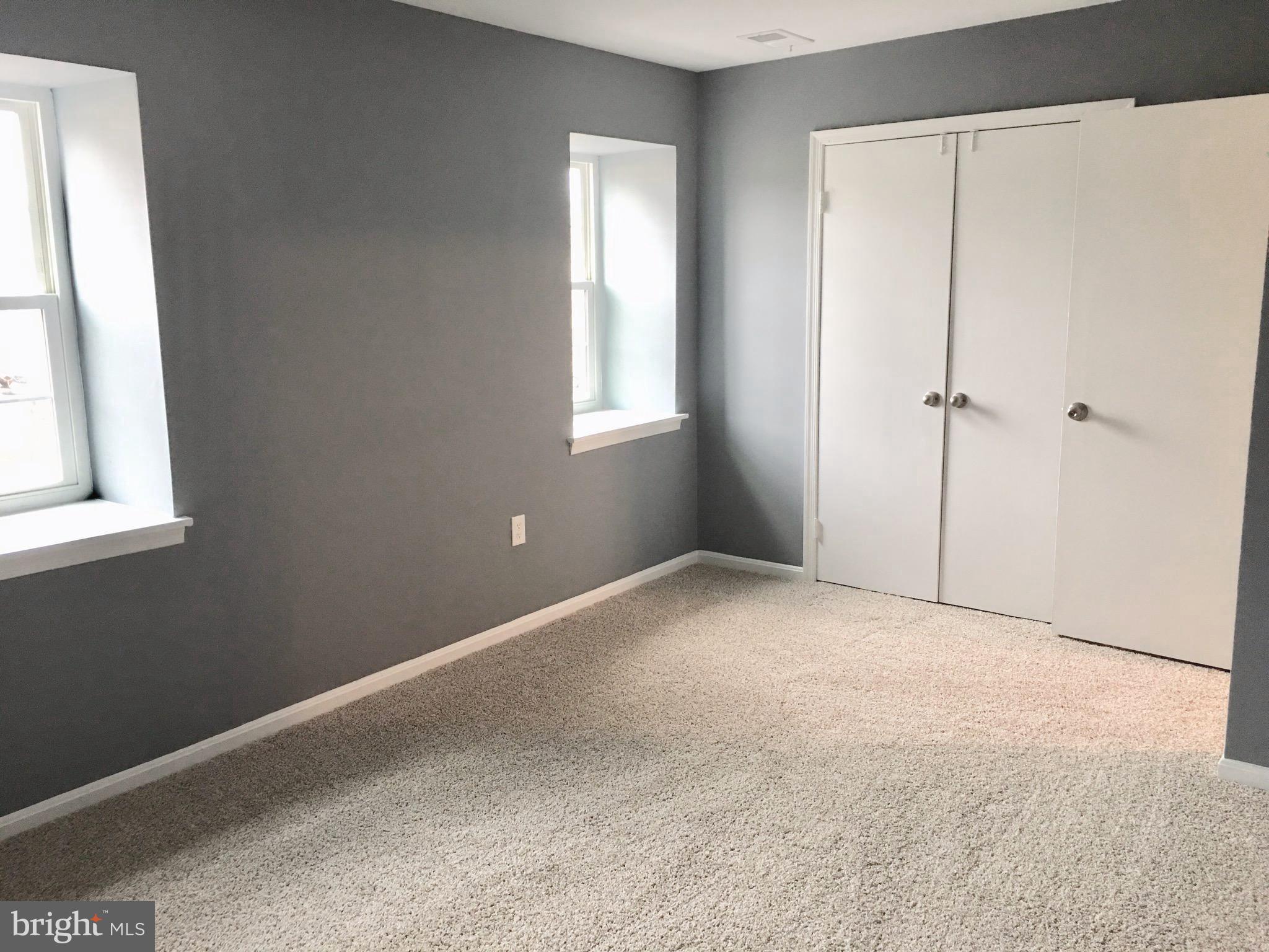 7635 Arbory Court, Unit 65 Laurel, MD 20707 - Photo 18 of 33 a view of empty room with windows