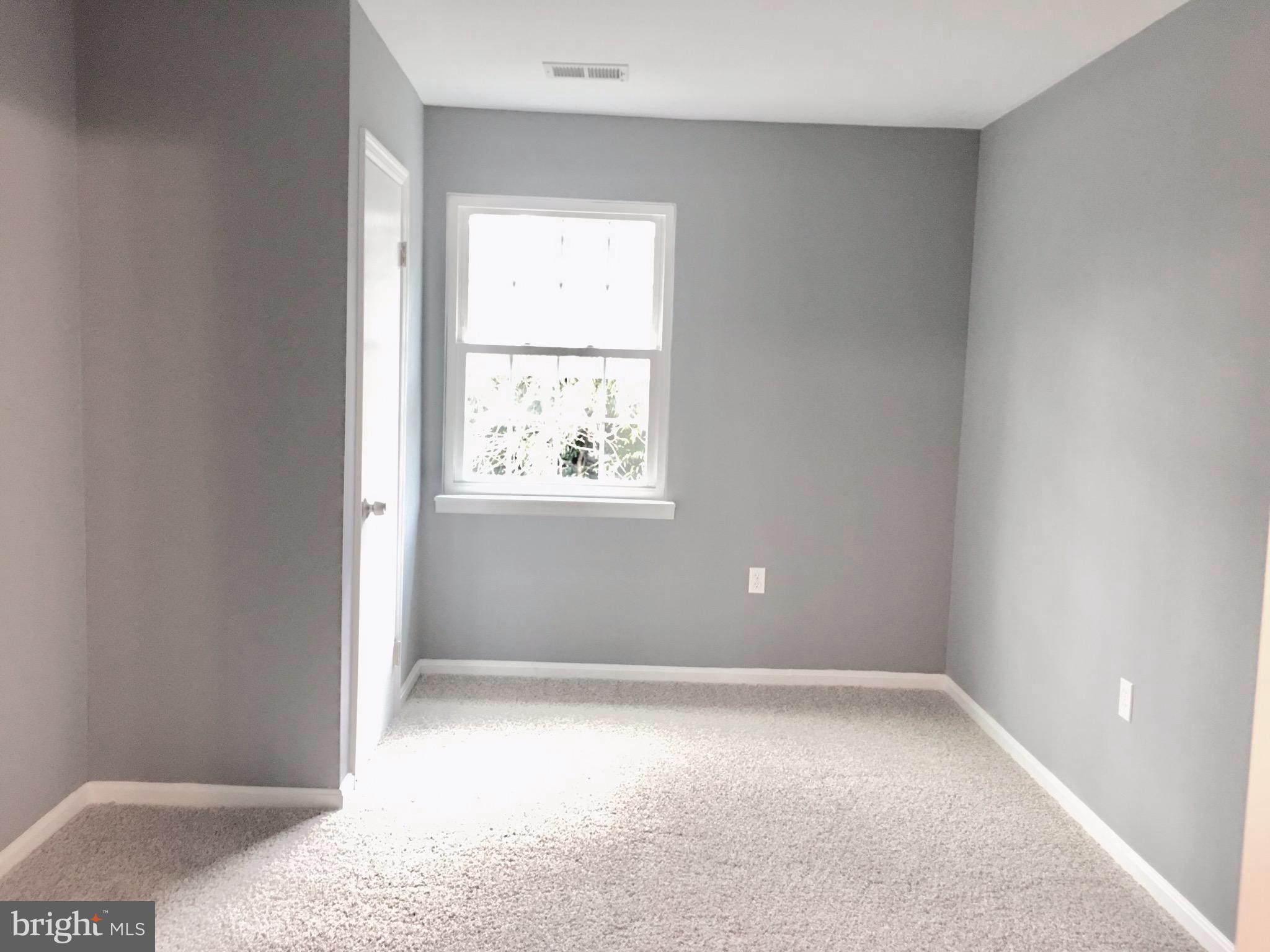 7635 Arbory Court, Unit 65 Laurel, MD 20707 - Photo 20 of 33 an empty room with a window