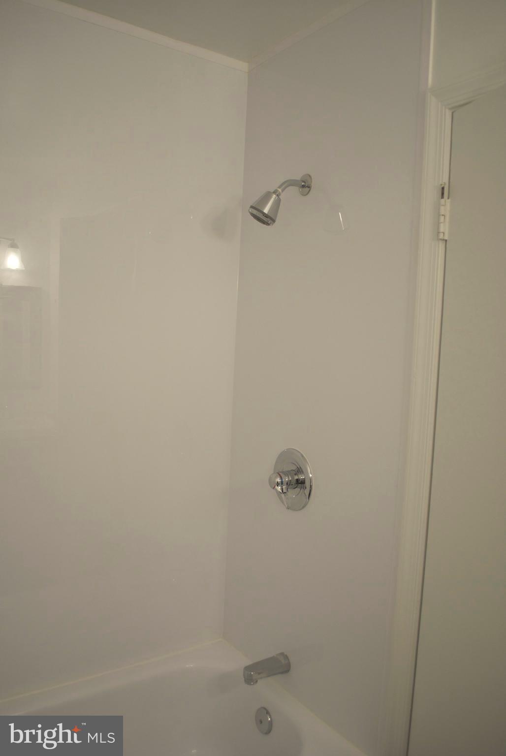 7635 Arbory Court, Unit 65 Laurel, MD 20707 - Photo 27 of 33 a bathroom with a shower