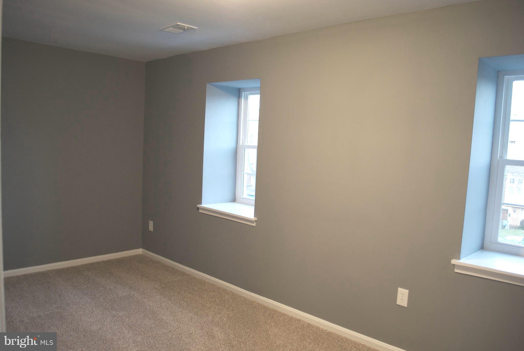 7635 Arbory Court, Unit 65 Laurel, MD 20707 - Photo 30 of 33 an empty room with a window