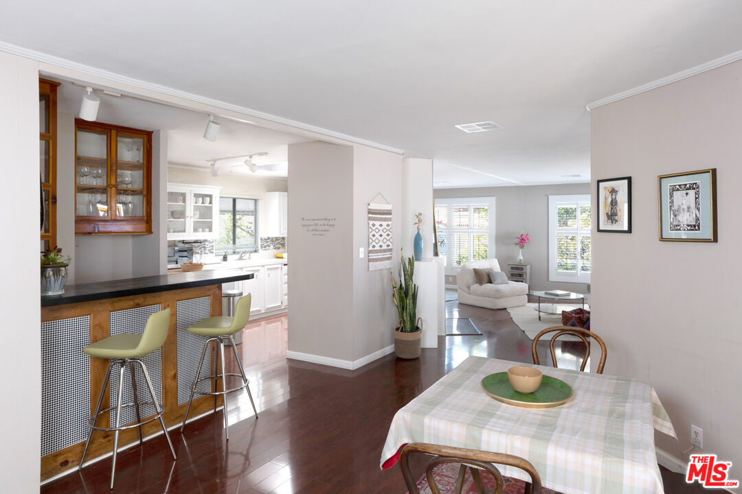 1183 Aztec Topanga, CA 90290 - Photo 17 of 68 a living room with furniture and wooden floor