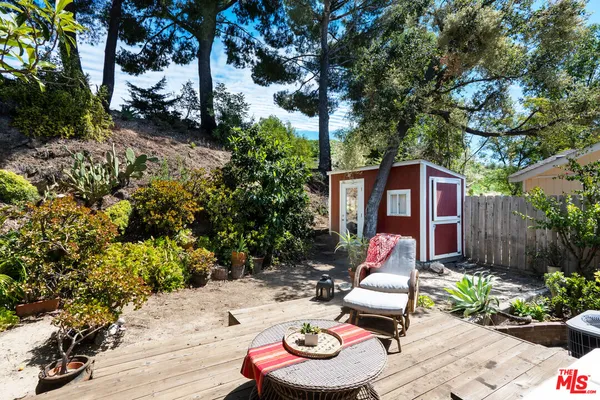 a kitchen with stainless steel appliances granite countertop a refrigerator and a stove