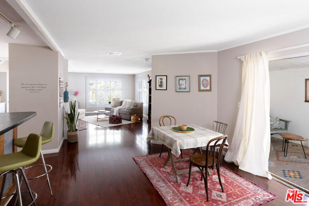 1183 Aztec Topanga, CA 90290 - Photo 21 of 68 a view of a dining room with furniture and wooden floor