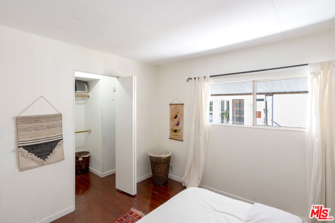 1183 Aztec Topanga, CA 90290 - Photo 24 of 68 a bathroom with a toilet and a shower