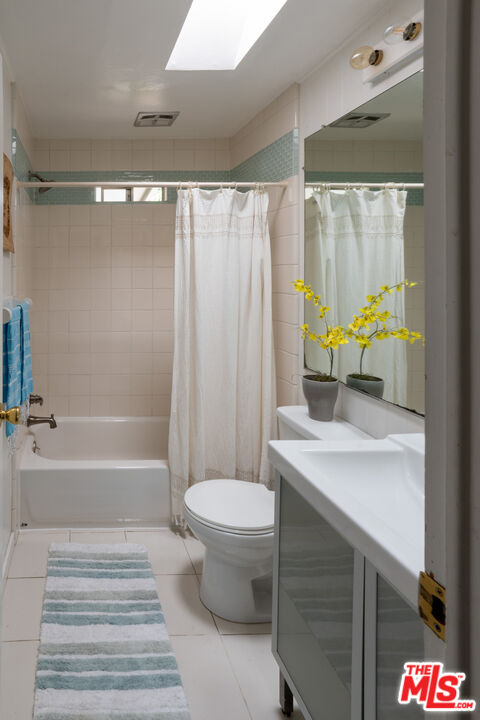 1183 Aztec Topanga, CA 90290 - Photo 26 of 68 a bathroom with a sink toilet and shower