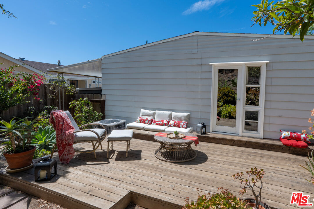 1183 Aztec Topanga, CA 90290 - Photo 27 of 68 a outdoor space with patio the couches and a potted plant