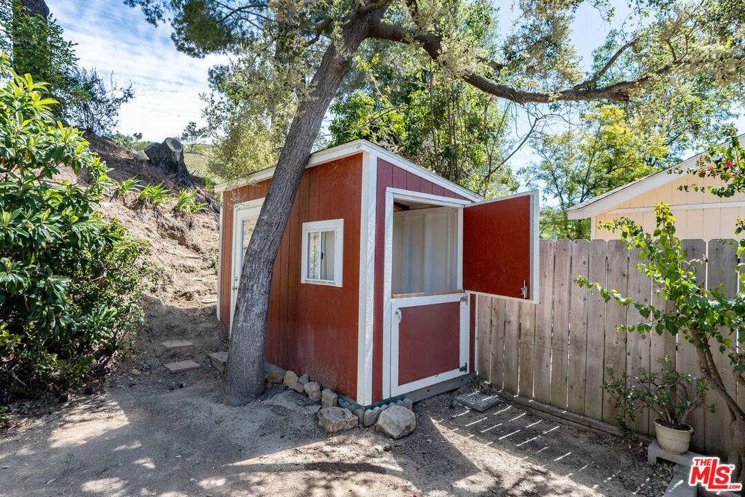 1183 Aztec Topanga, CA 90290 - Photo 35 of 68 a front view of a house with garden