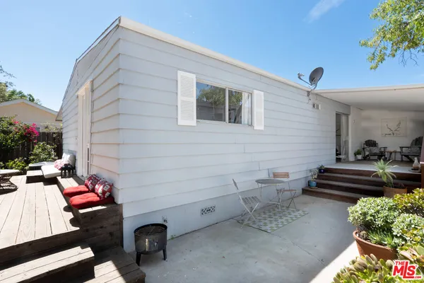 an aerial view of a house with a garden