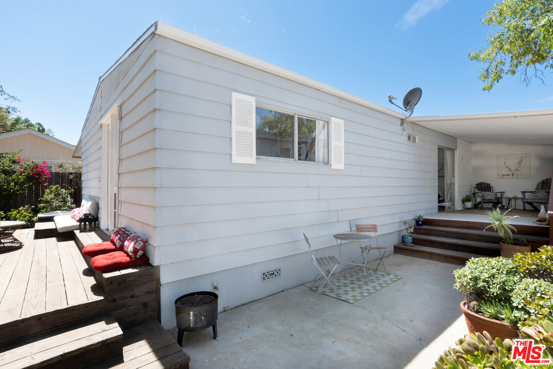 1183 Aztec Topanga, CA 90290 - Photo 39 of 68 a view of a chairs and table in a patio