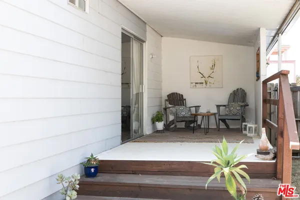 a view of house with outdoor space and entertaining space