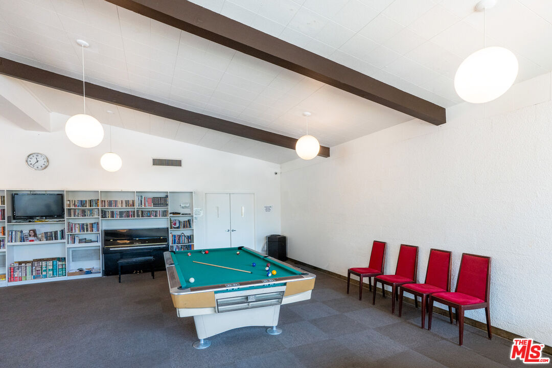 1183 Aztec Topanga, CA 90290 - Photo 58 of 68 a room with furniture and air hockey table