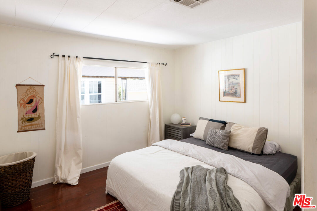 1183 Aztec Topanga, CA 90290 - Photo 8 of 68 a bedroom with a bed and a window