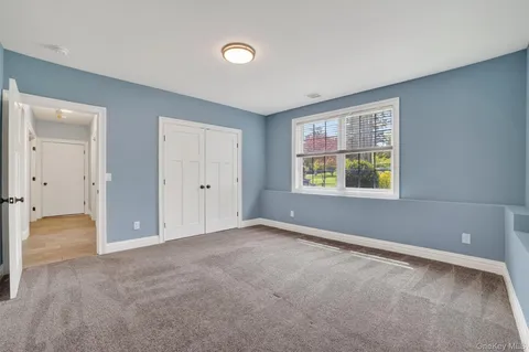 a view of an empty room with window
