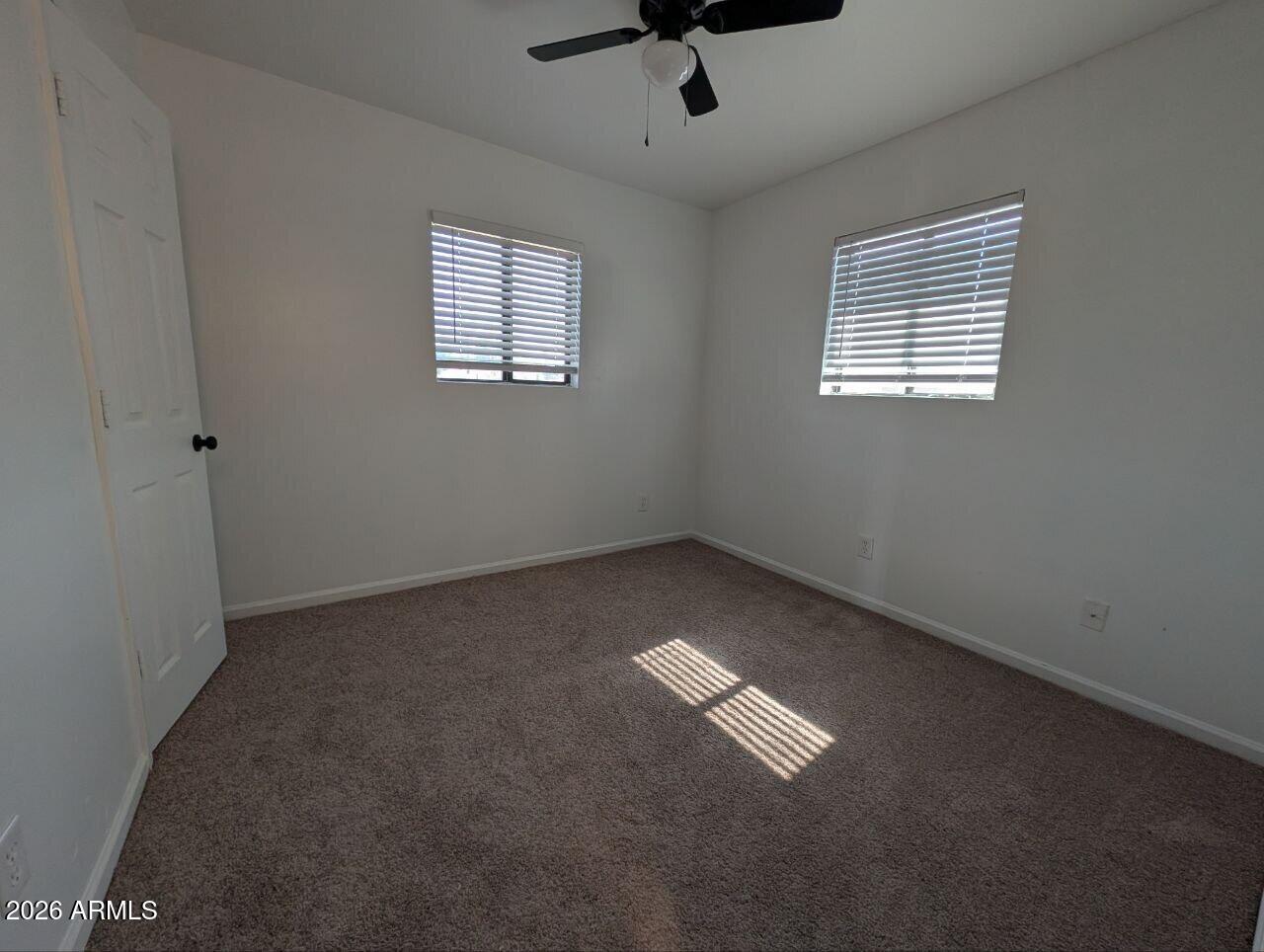 9602 North 18th Avenue Phoenix, AZ 85021 - Photo 14 of 18 an empty room with a window