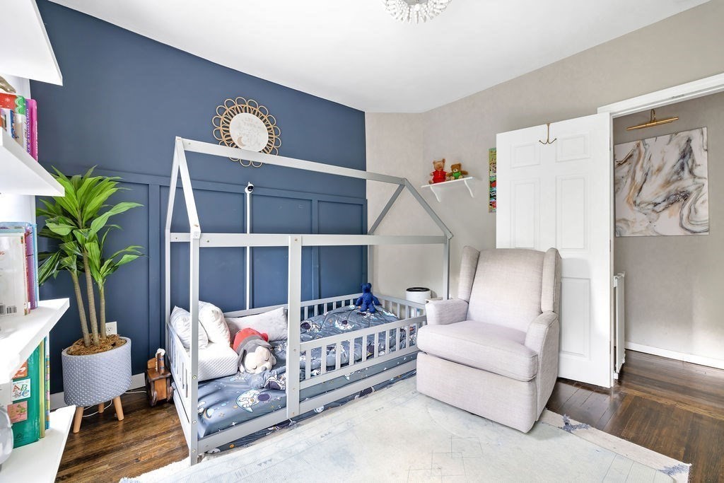 4 Bayberry Road Worcester, MA 01606 - Photo 19 of 31 a bedroom with furniture and a potted plant