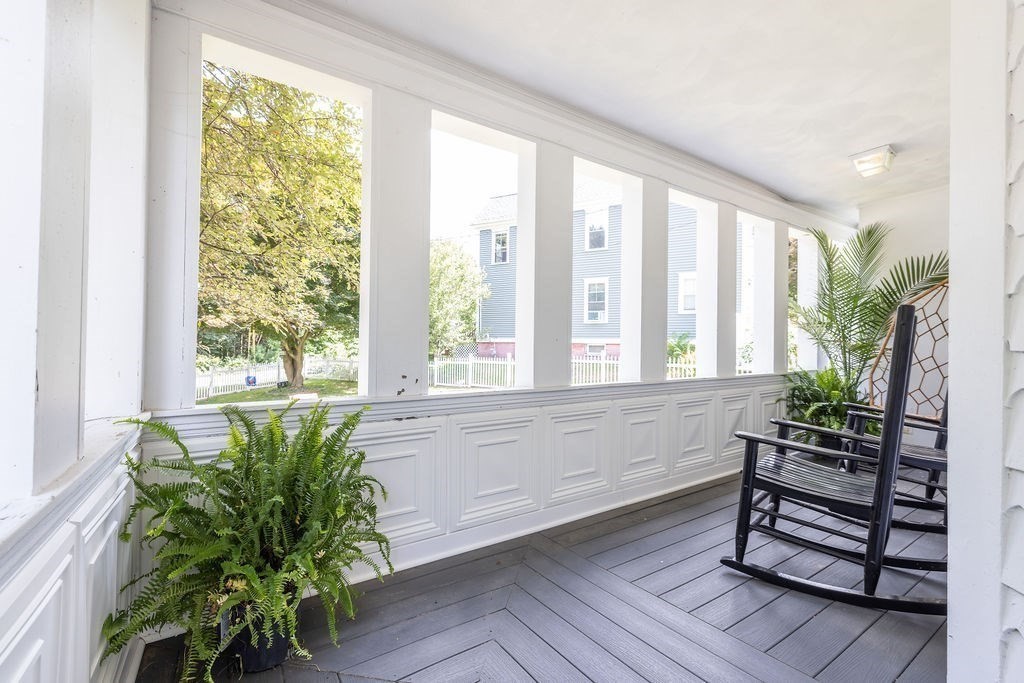 4 Bayberry Road Worcester, MA 01606 - Photo 24 of 31 a living room filled with furniture and a potted plant