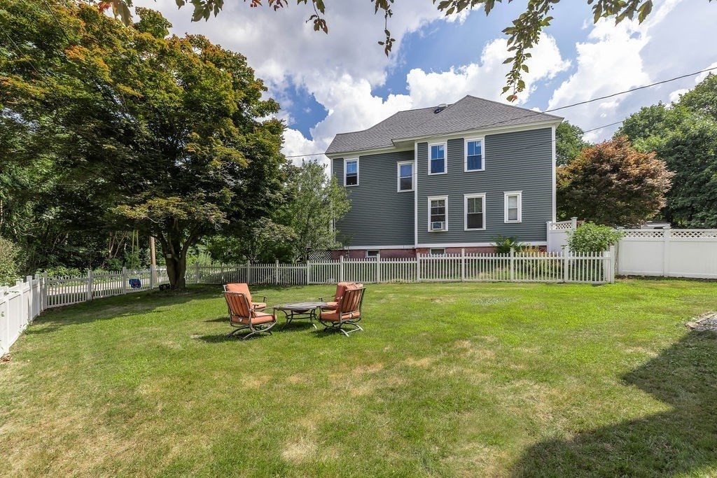 4 Bayberry Road Worcester, MA 01606 - Photo 31 of 31 a front view of a house with a yard table and chairs
