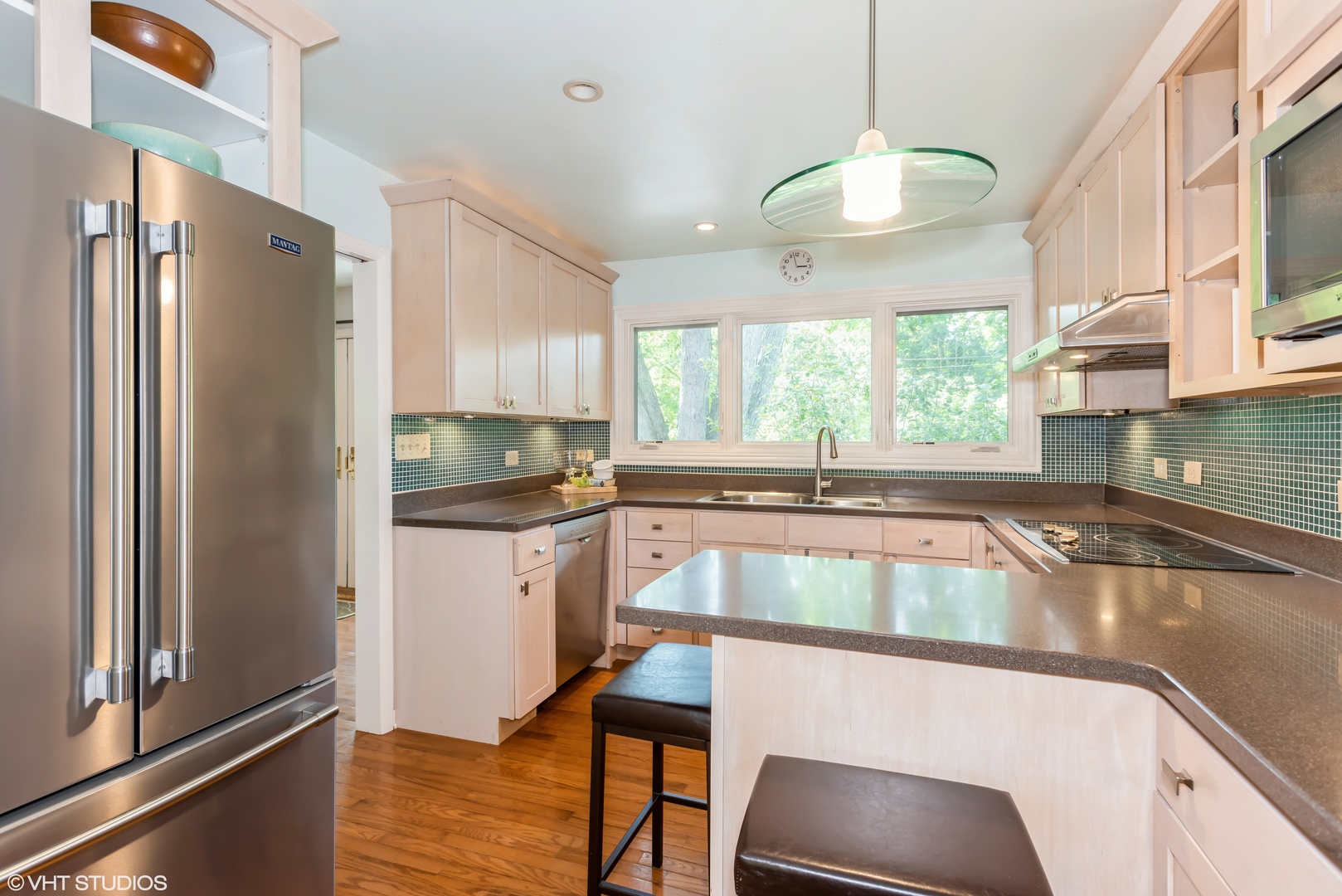 25W560 Piccadilly Road Wheaton, IL 60189 - Photo 14 of 33 a kitchen with granite countertop a refrigerator and a sink