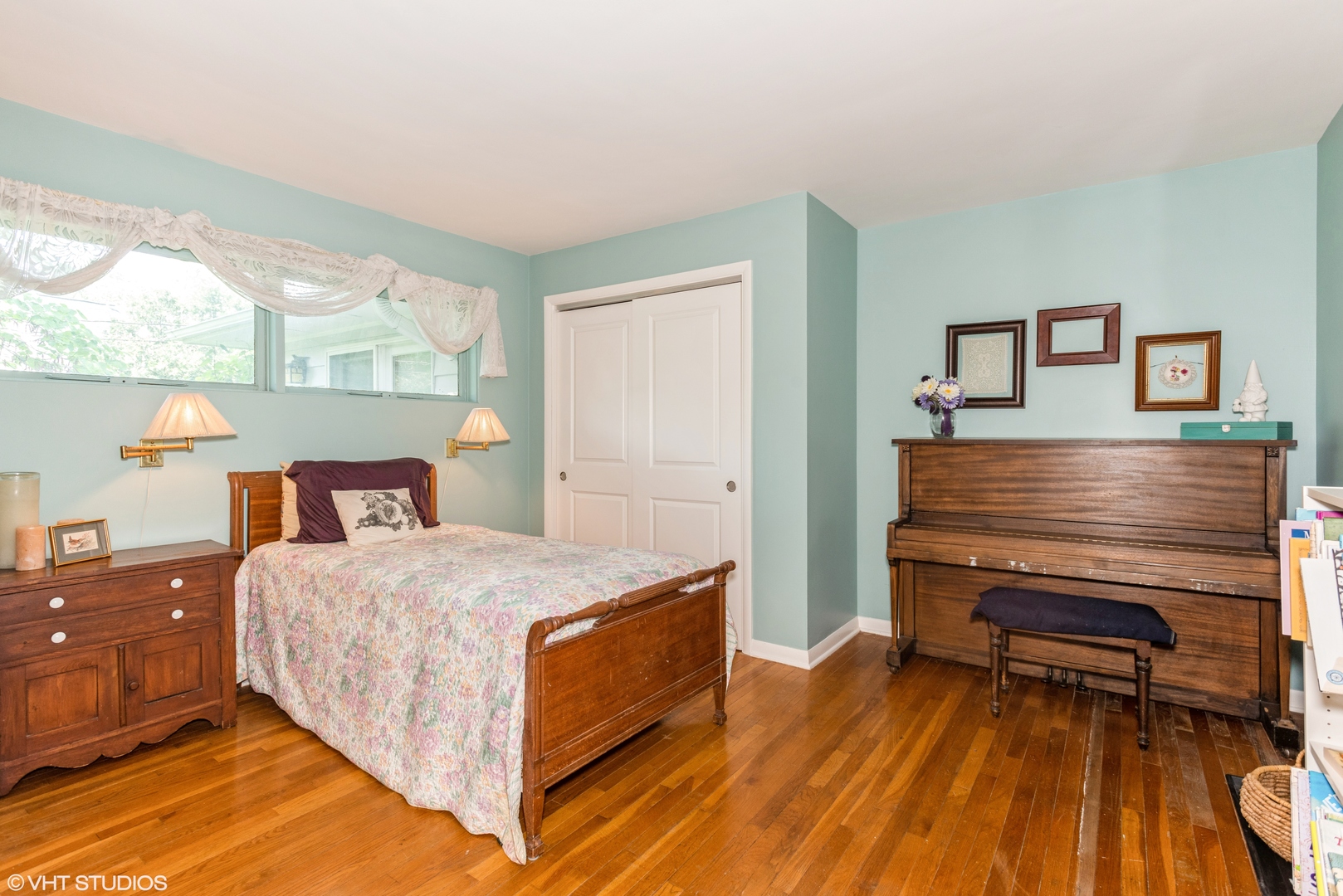 25W560 Piccadilly Road Wheaton, IL 60189 - Photo 17 of 33 a bedroom with a bed and wooden floor