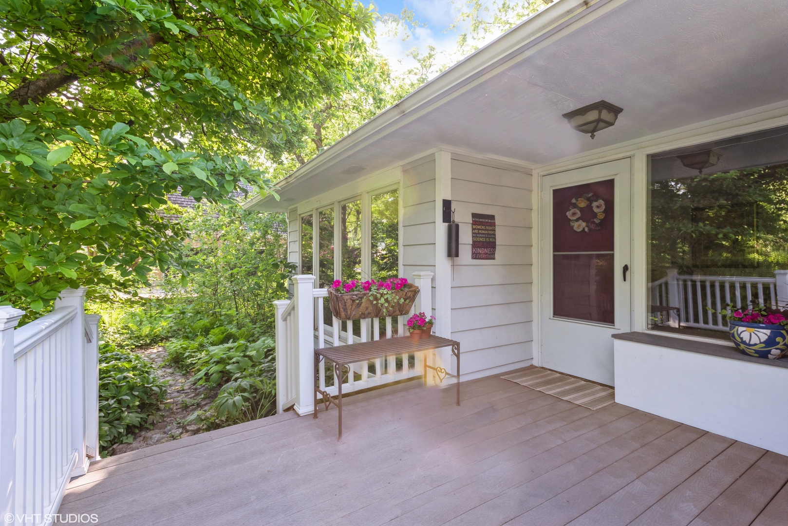 25W560 Piccadilly Road Wheaton, IL 60189 - Photo 5 of 33 a view of a porch with wooden walls and stairs
