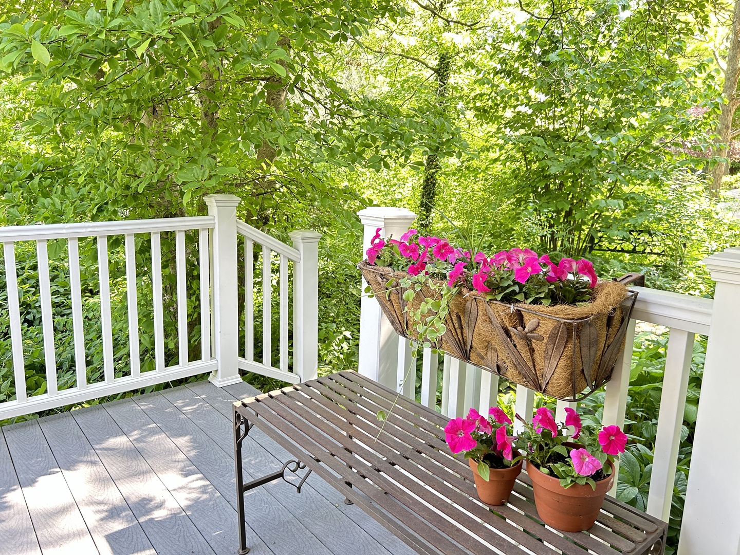 25W560 Piccadilly Road Wheaton, IL 60189 - Photo 6 of 33 a wooden bench sitting in front of a house