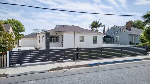 a view of a house with a street