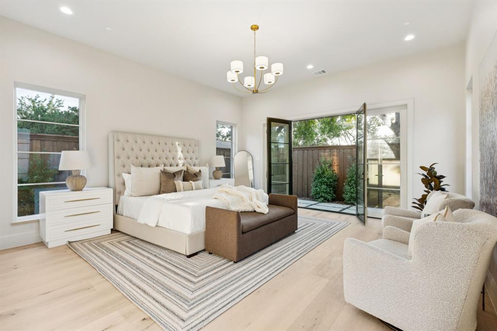 11815 Jamestown Road Dallas, TX 75230 - Photo 13 of 39 a living room with furniture chandelier and a large window