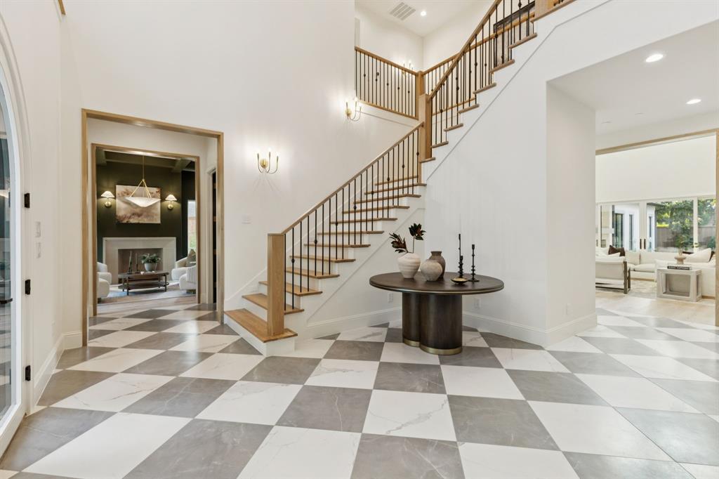 11815 Jamestown Road Dallas, TX 75230 - Photo 36 of 39 a view of a hallway with a black and white checkered floor
