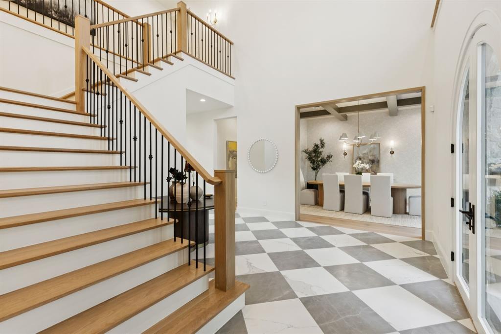 11815 Jamestown Road Dallas, TX 75230 - Photo 4 of 39 a view of entryway with dining room and rug