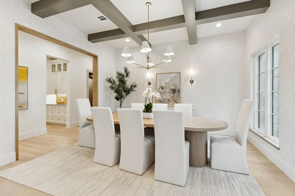 11815 Jamestown Road Dallas, TX 75230 - Photo 5 of 39 a view of a dining room with furniture and wooden floor