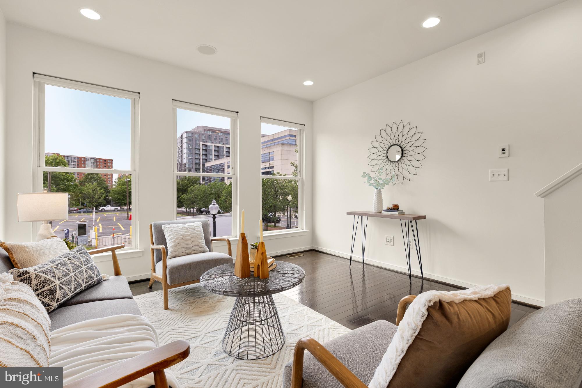 906 3rd Street Southeast Washington, DC 20003 - Photo 3 of 14 a living room with furniture and a large window