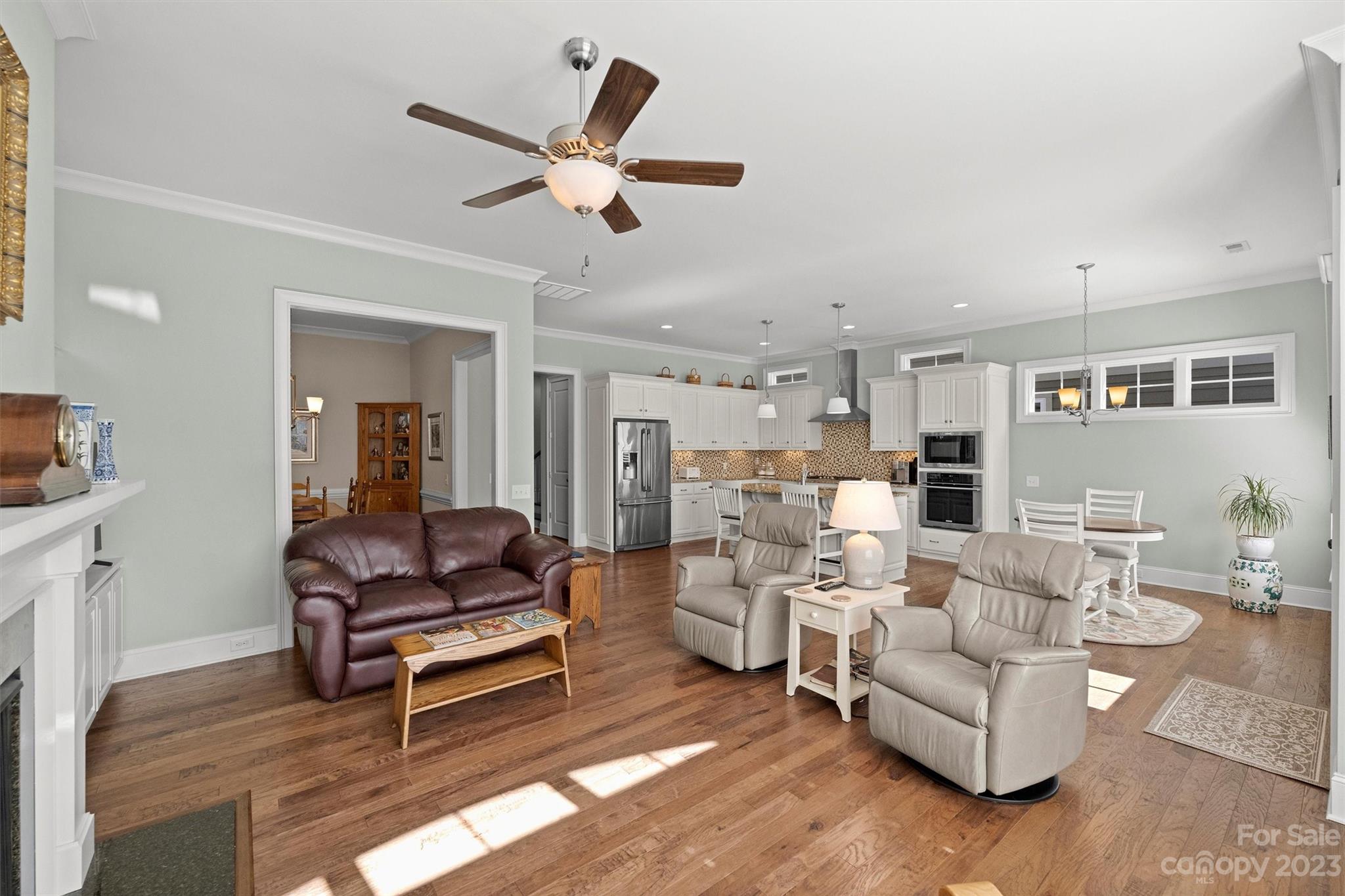 111 Boyce Road Charlotte, NC 28211 - Photo 14 of 38 a living room with furniture and a wooden floor