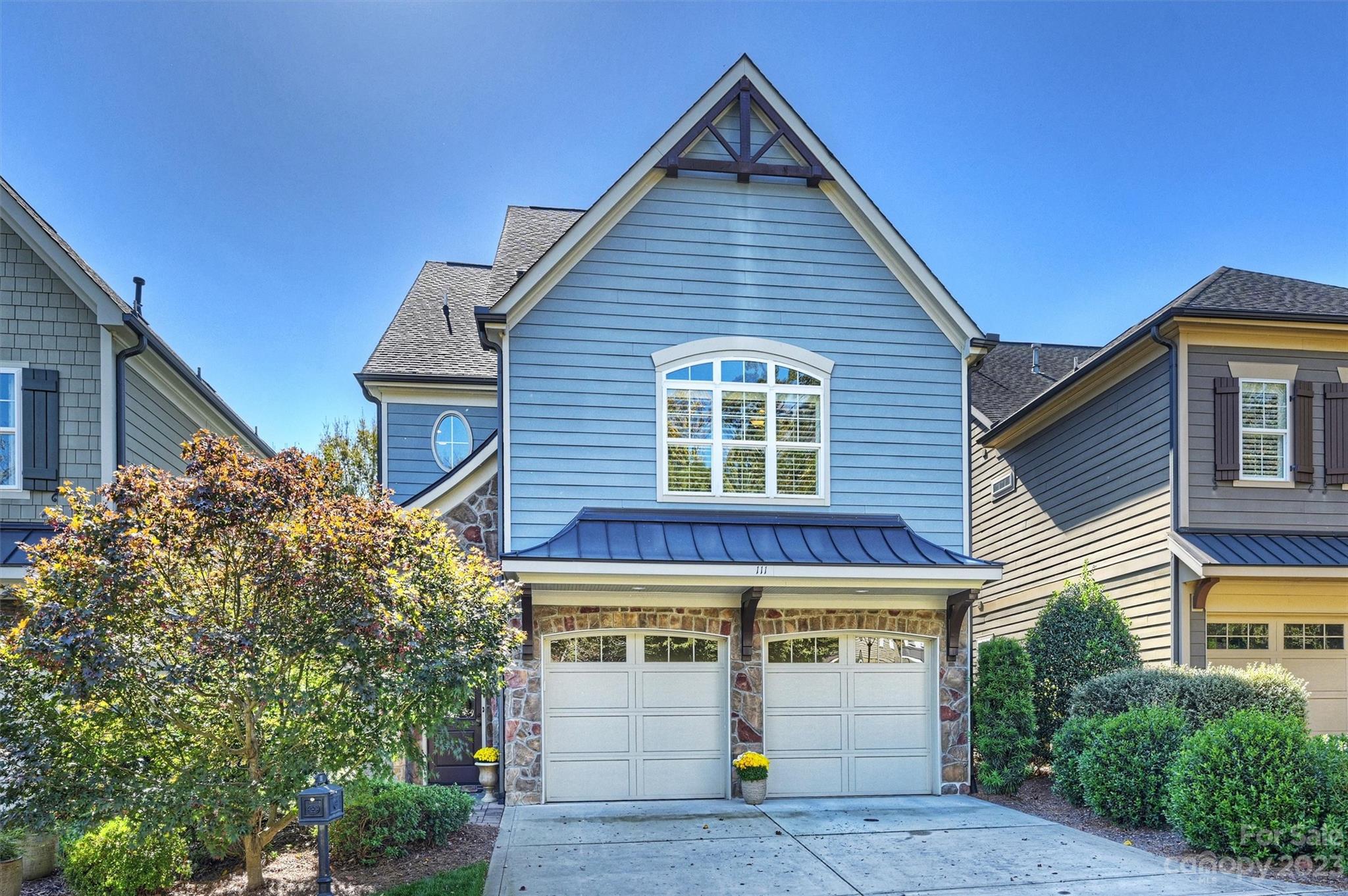 111 Boyce Road Charlotte, NC 28211 - Photo 2 of 38 a view of a house with garage