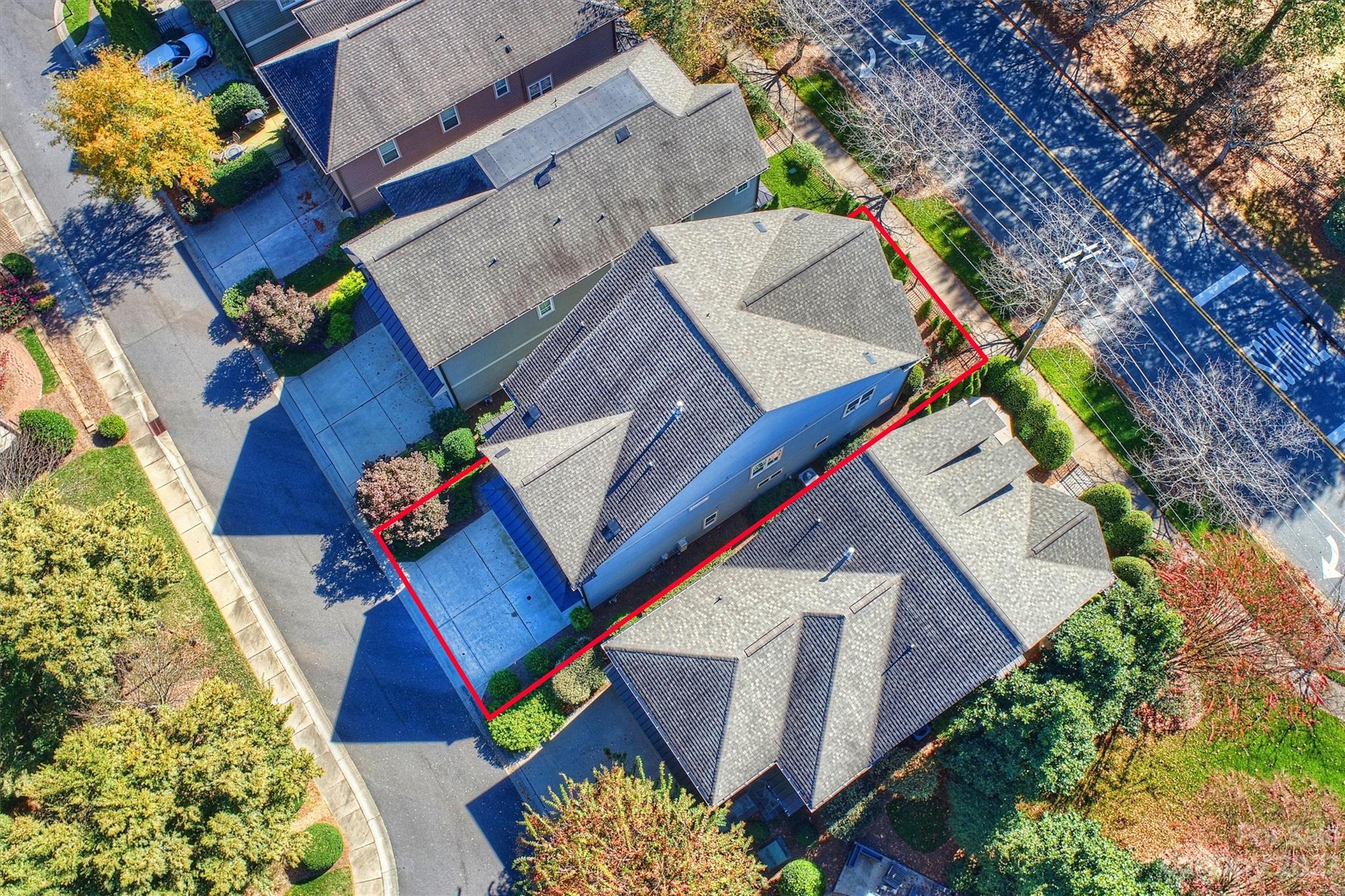 111 Boyce Road Charlotte, NC 28211 - Photo 35 of 38 an aerial view of a house with a yard and staircase