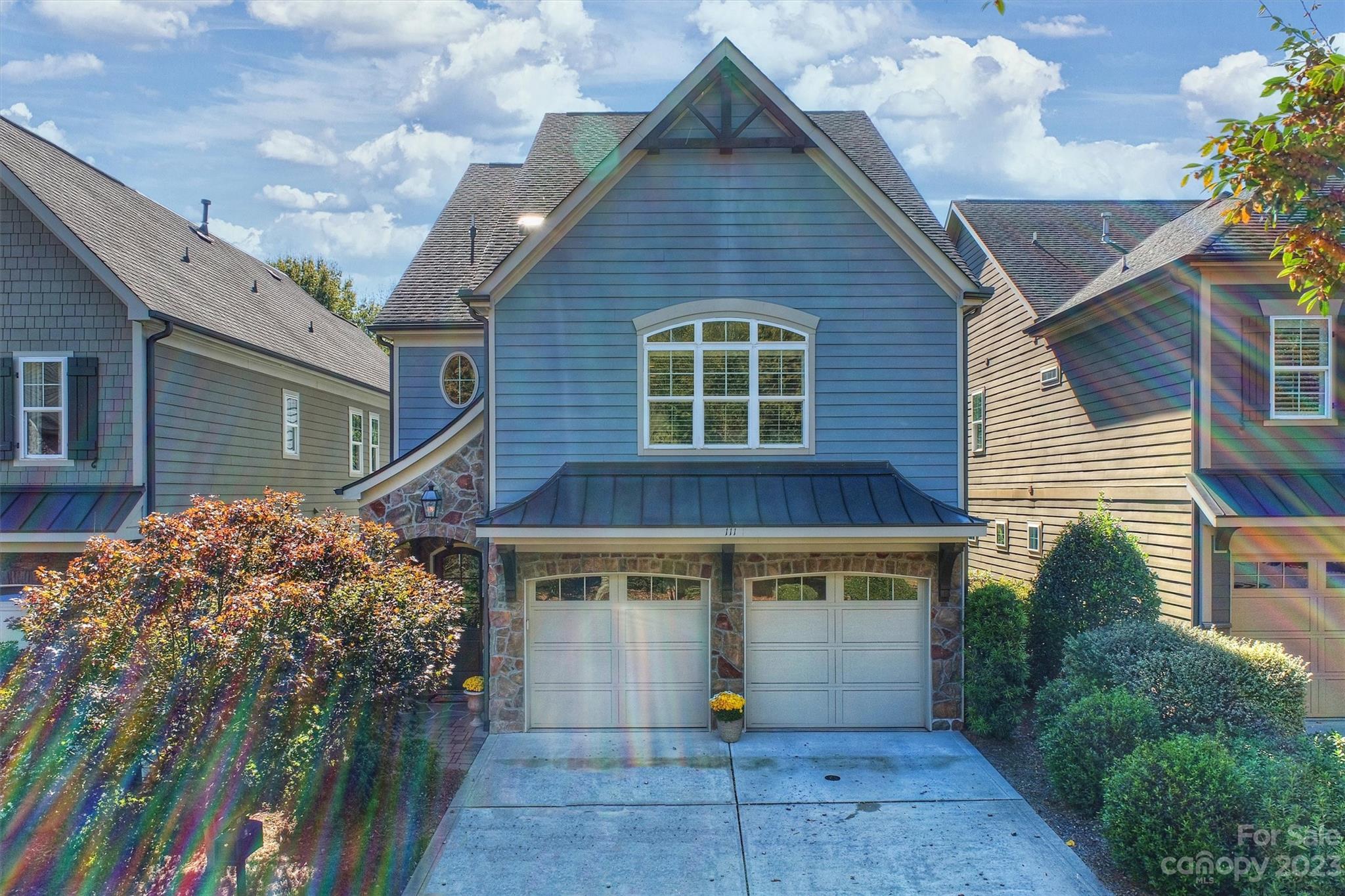 111 Boyce Road Charlotte, NC 28211 - Photo 4 of 38 a view of a house with brick walls