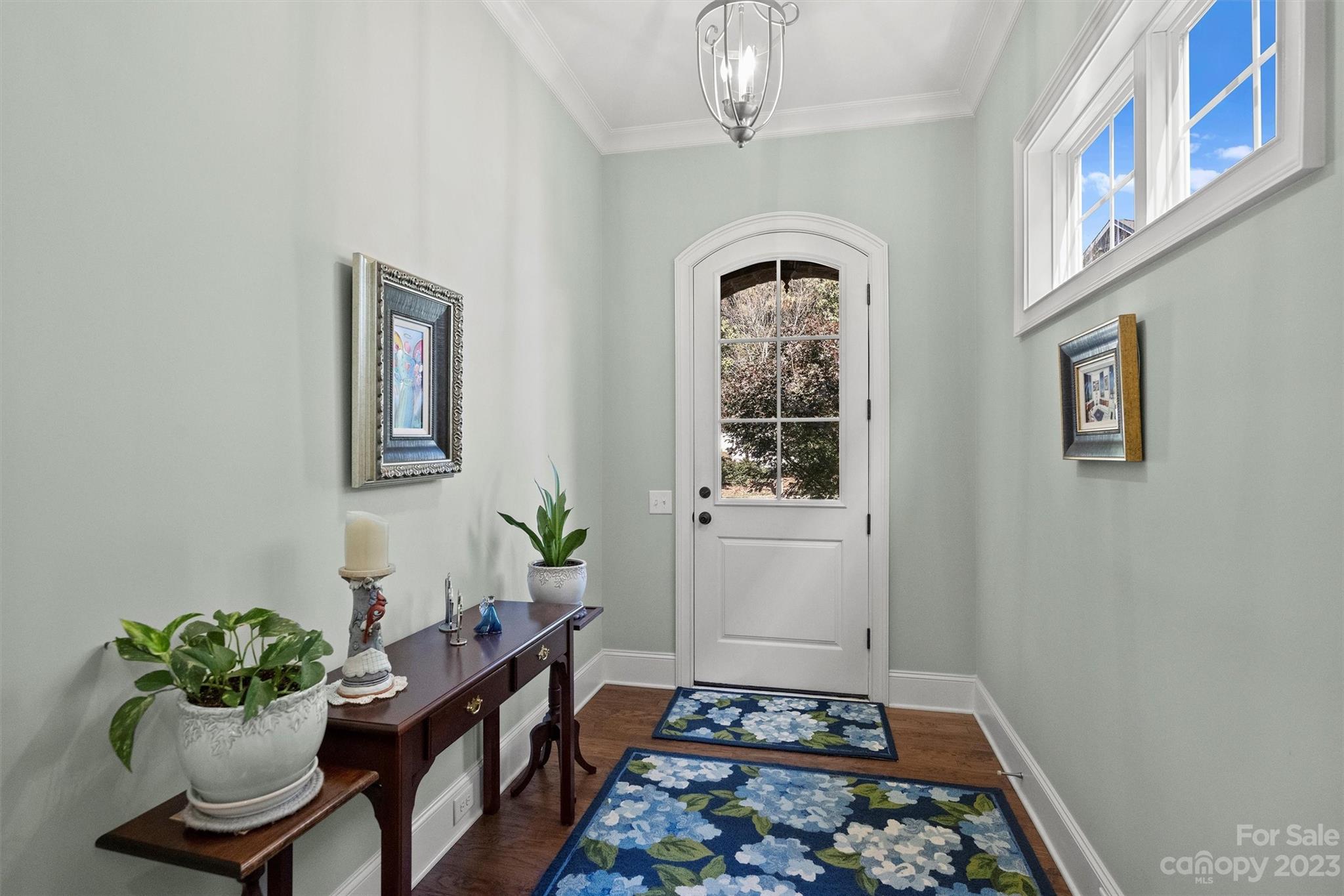 111 Boyce Road Charlotte, NC 28211 - Photo 8 of 38 a living room with furniture and a potted plant