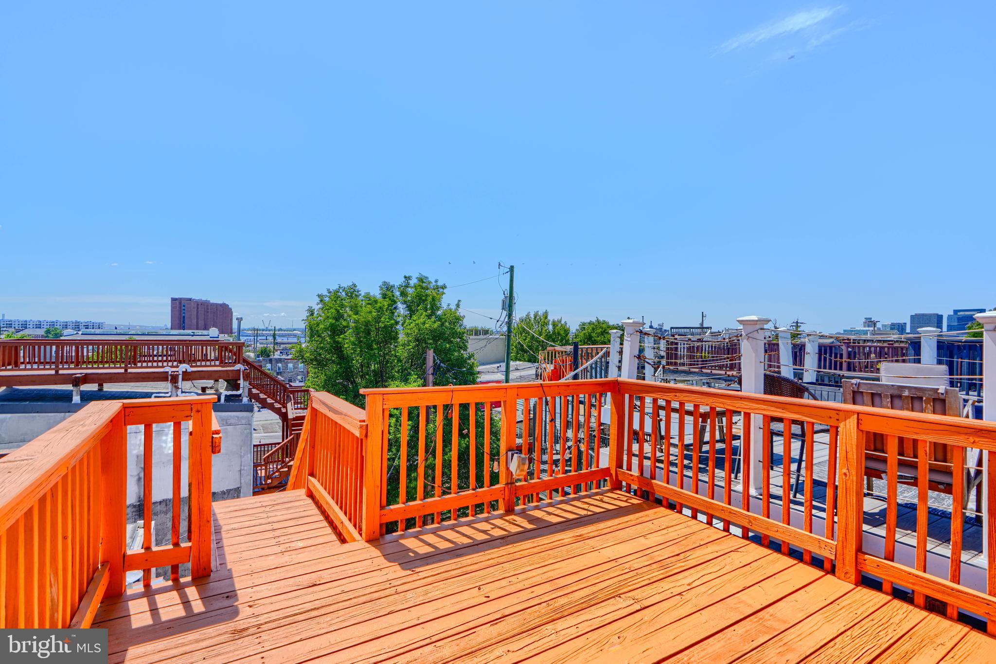 2519 Fleet Street Baltimore, MD 21224 - Photo 2 of 31 a balcony with outdoor seating