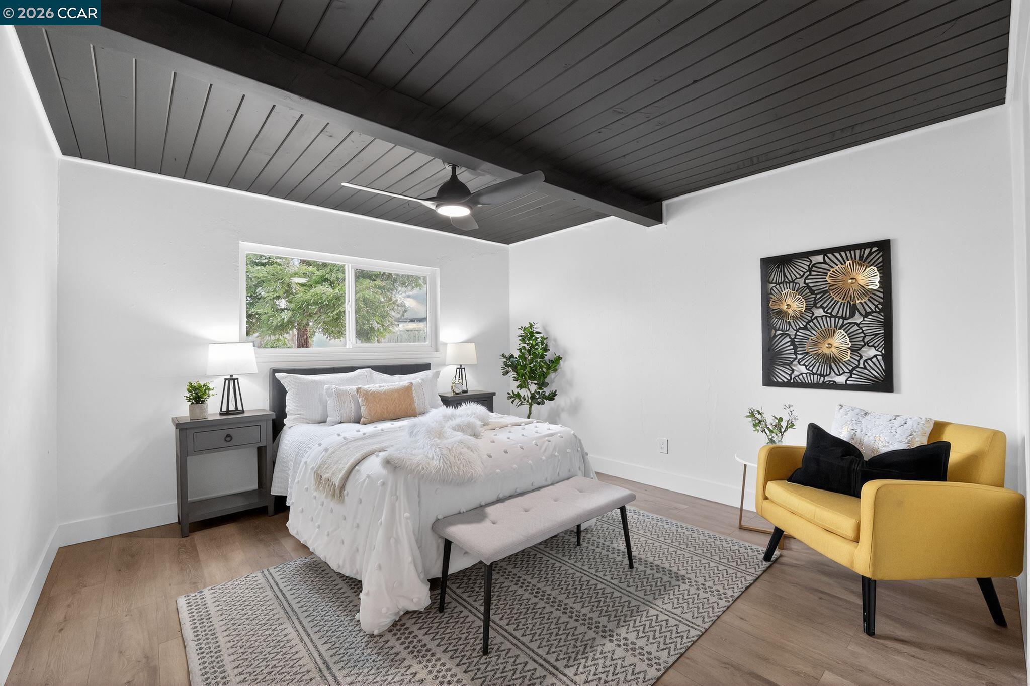 1838 Overhill Road Concord, CA 94520 - Photo 12 of 25 a bedroom with furniture and a large window