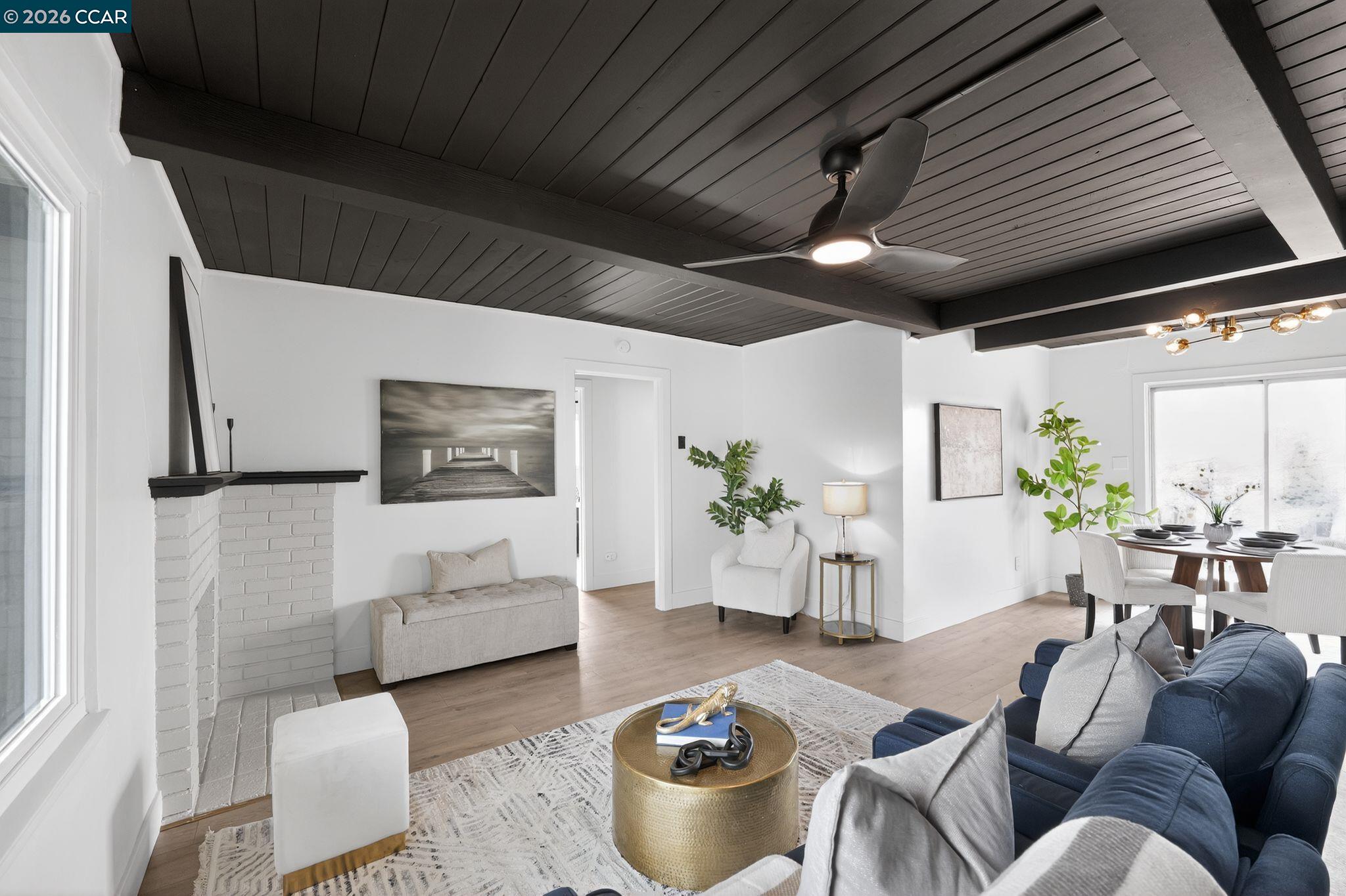 1838 Overhill Road Concord, CA 94520 - Photo 2 of 25 a living room with furniture and a potted plant